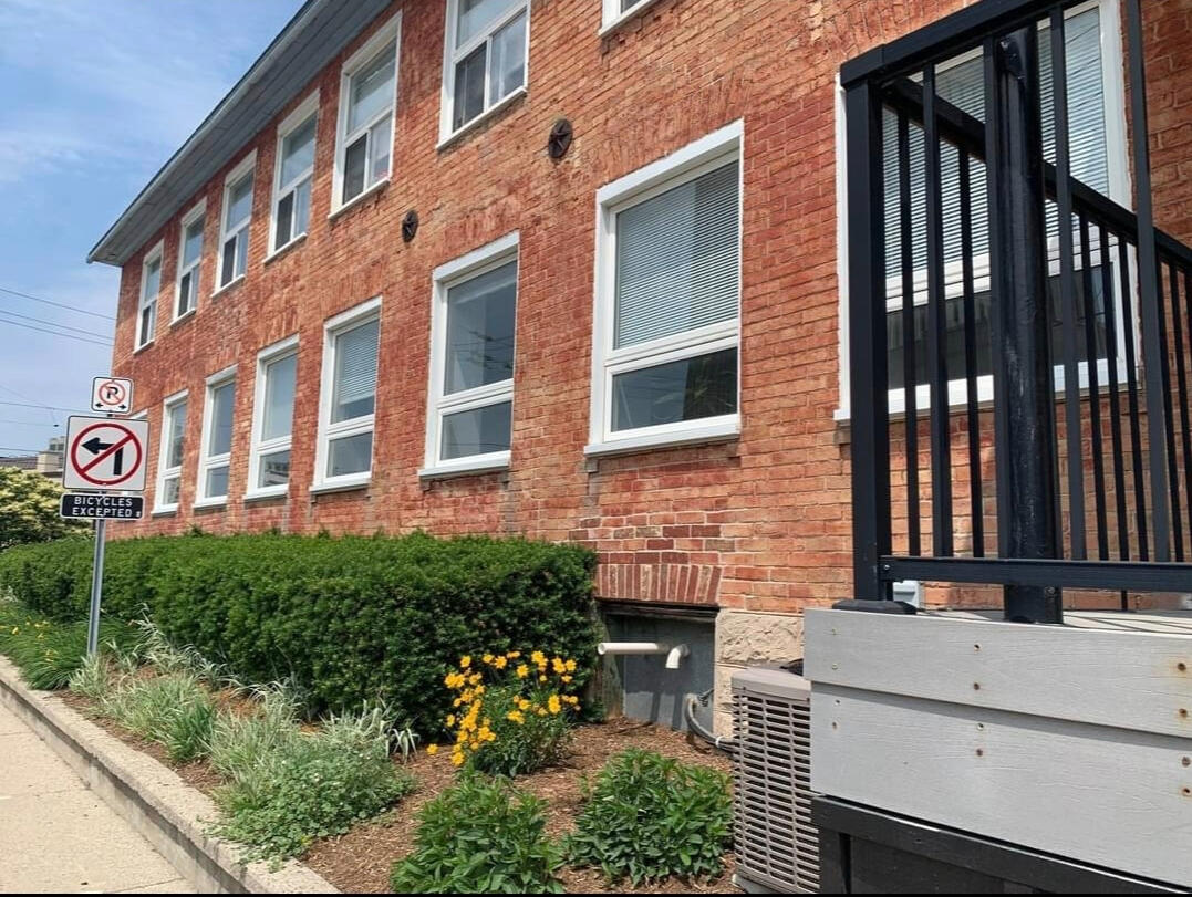 building Exterior of the therapy office building with a red brick entrance